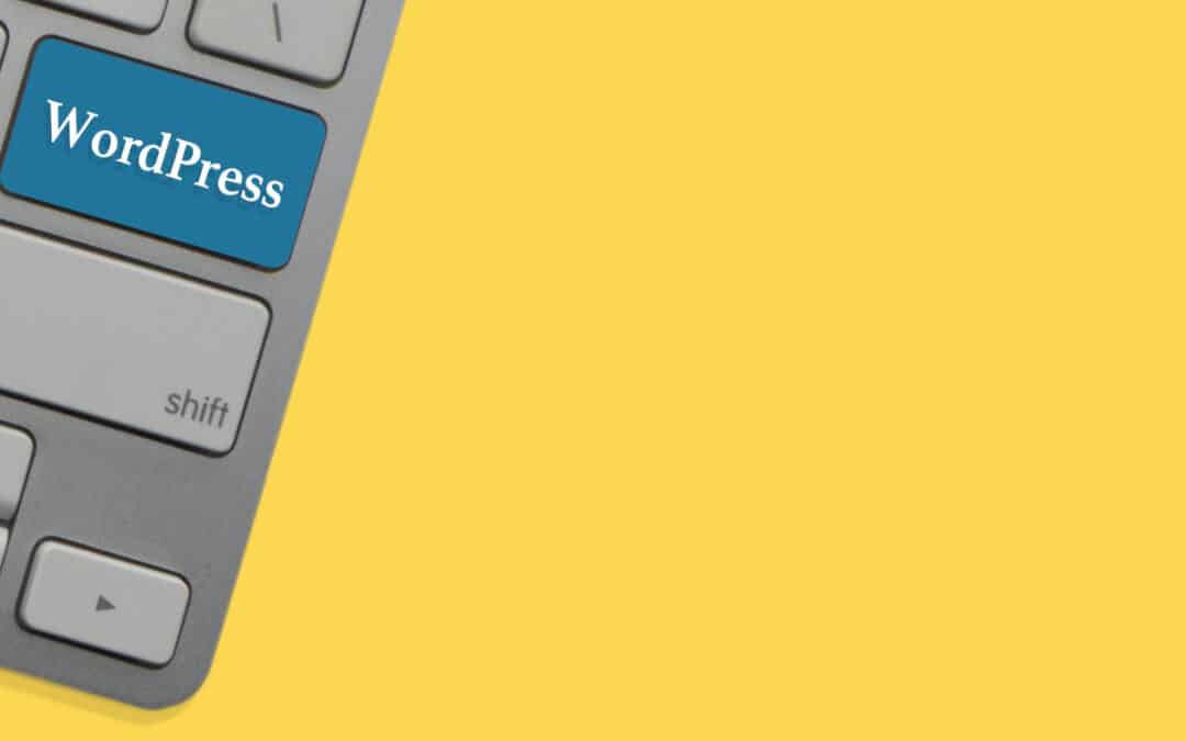 Choosing a theme for your WordPress website should be as easy as pressing the blue WordPress button on this keyboard against a yellow background.